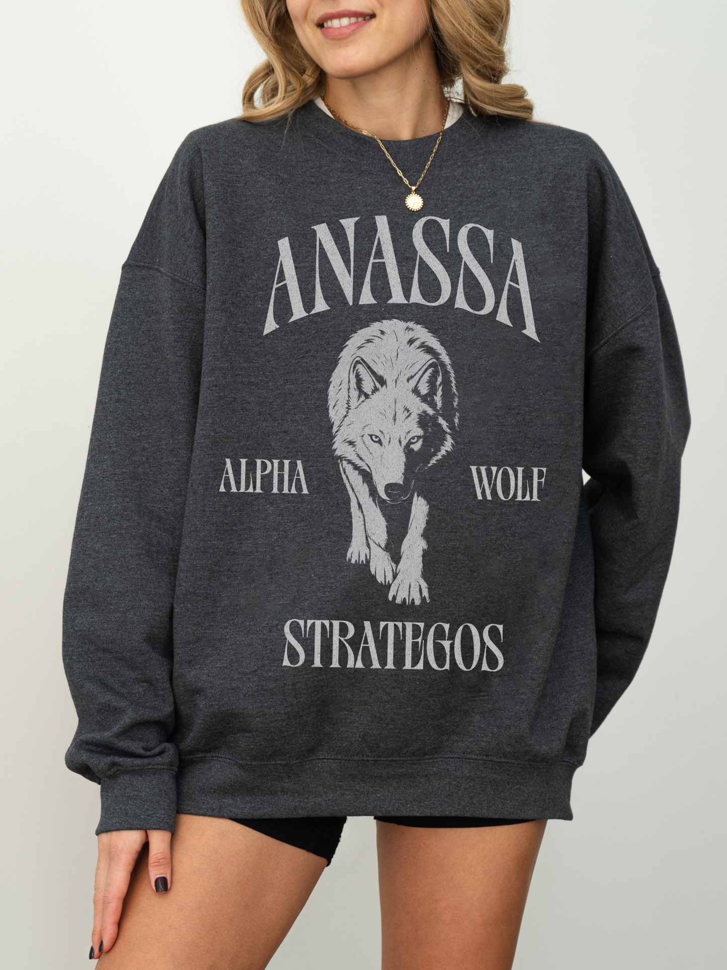 dark grey heather sweatshirt with Anassa Alpha Wolf Strategos wolf illustration inspired by fantasy romance books