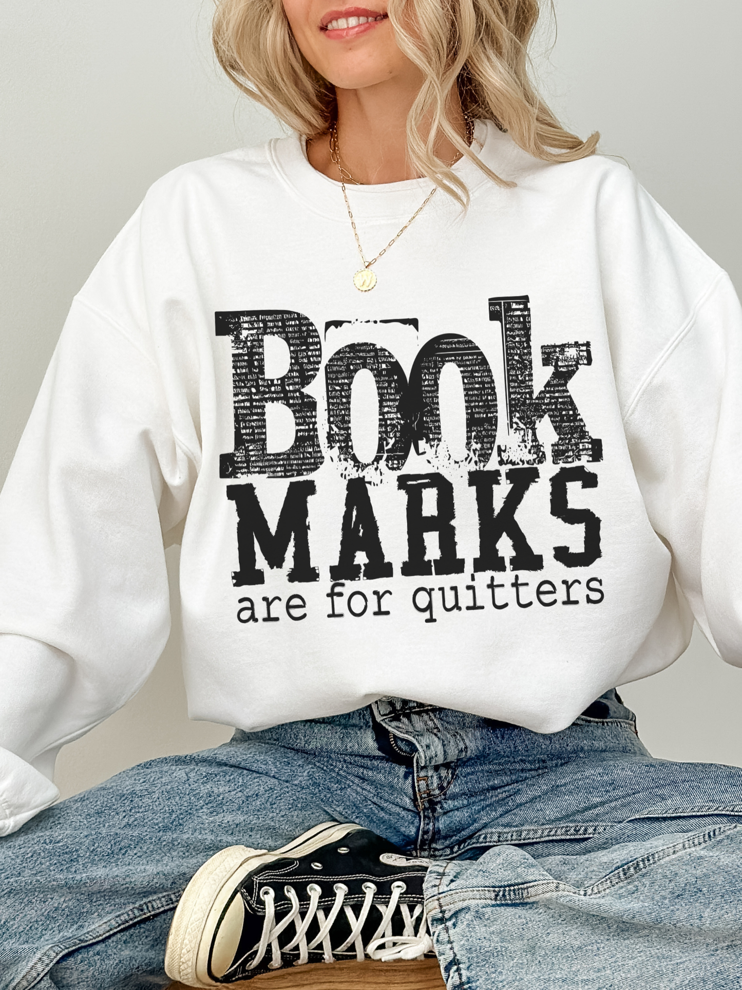 white gildan sweatshirt with black distressed book marks are for quitters typography graphic for avid readers