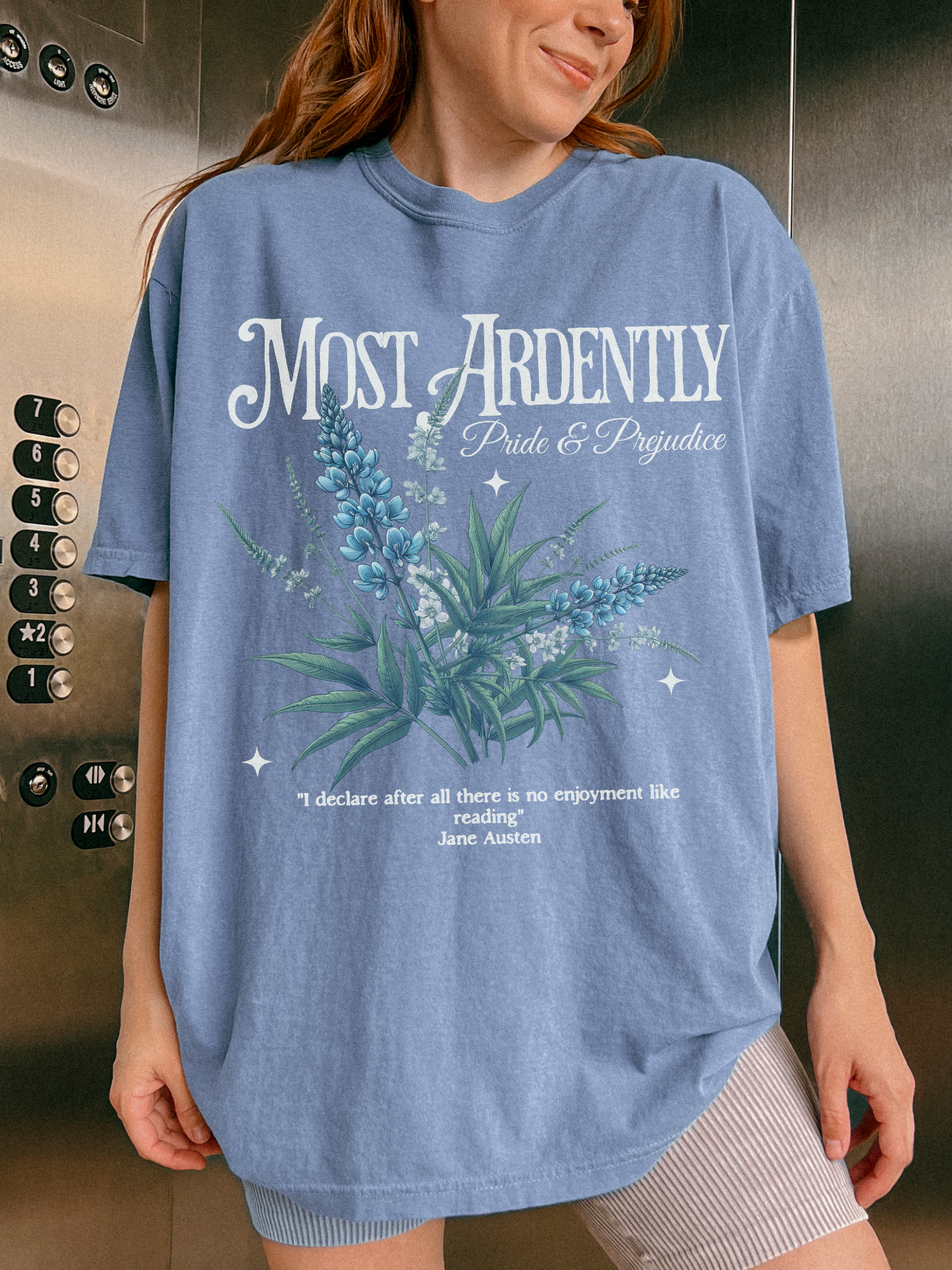 woman in denim blue Jane Austen t-shirt featuring Most Ardently quote and vintage floral design