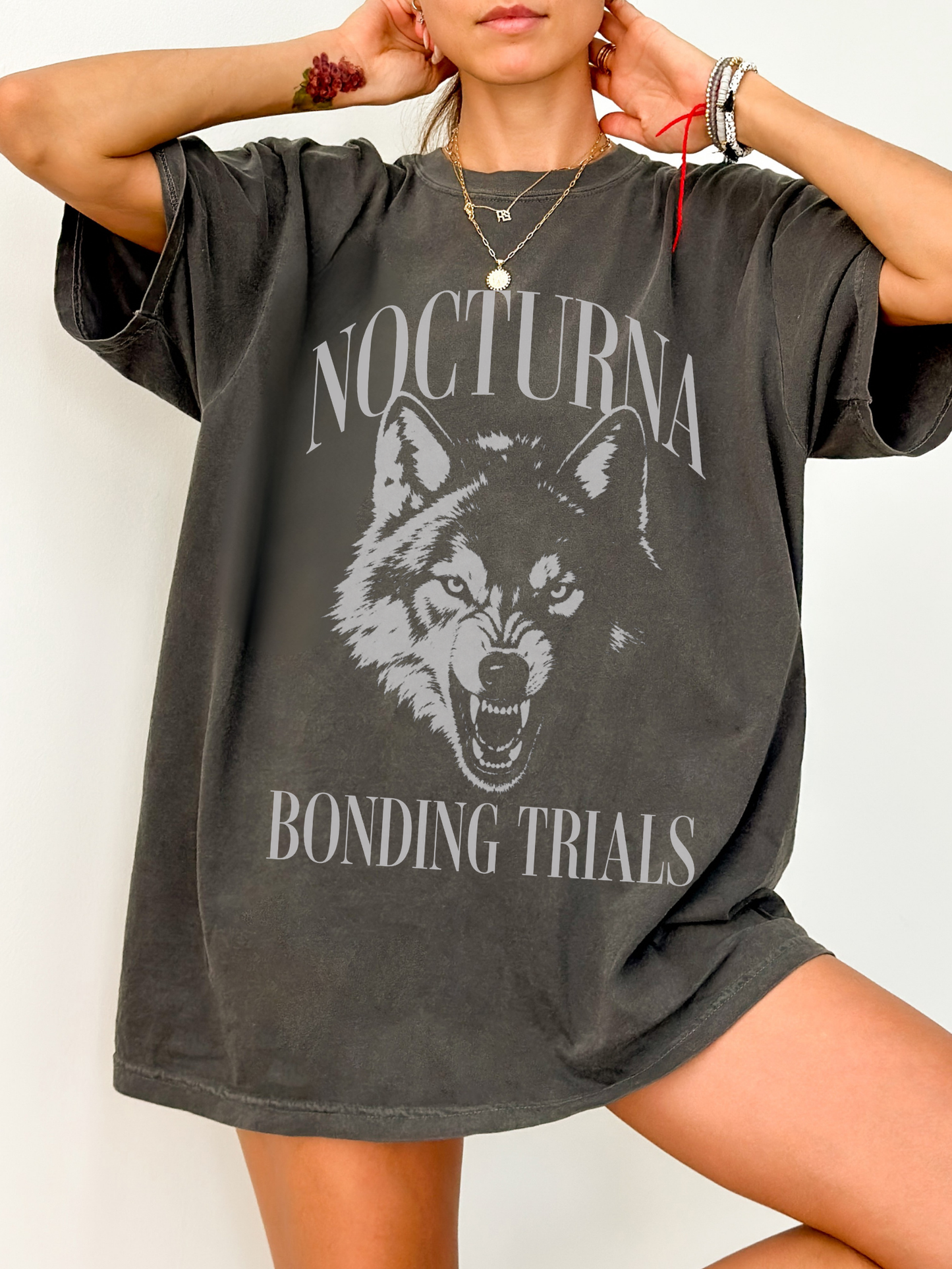 pepper comfort colors oversized t shirt featuring Nocturna Bonding Trials wolf fantasy inspired graphic