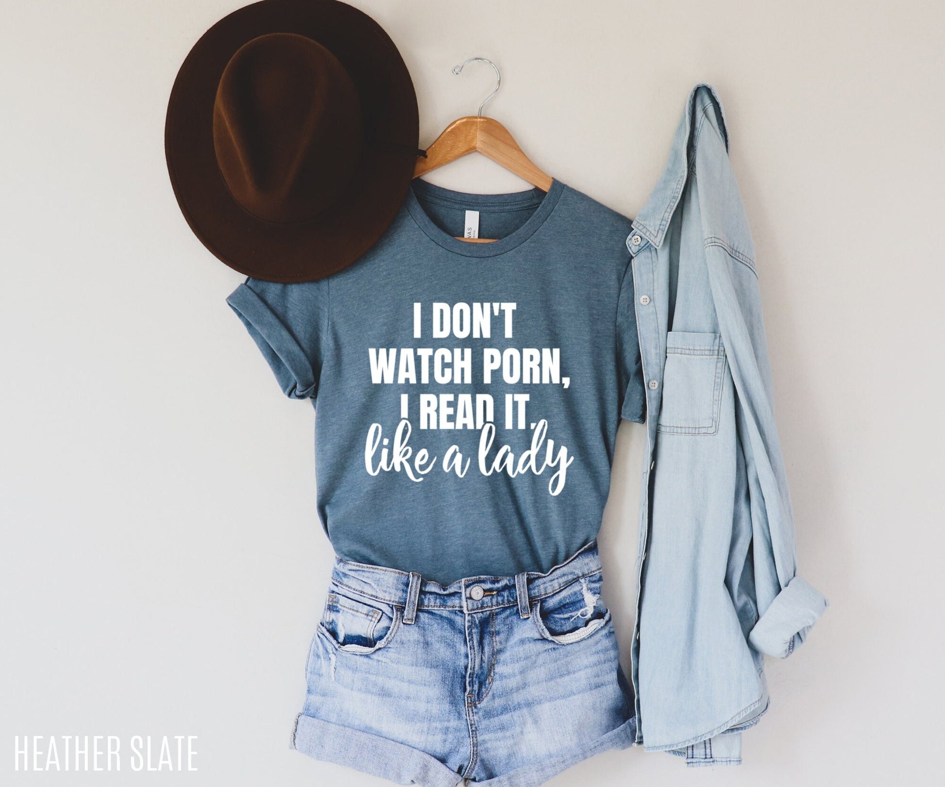 heather slate t-shirt that says i don't watch porn i read it like a lady styled with hat and shorts
