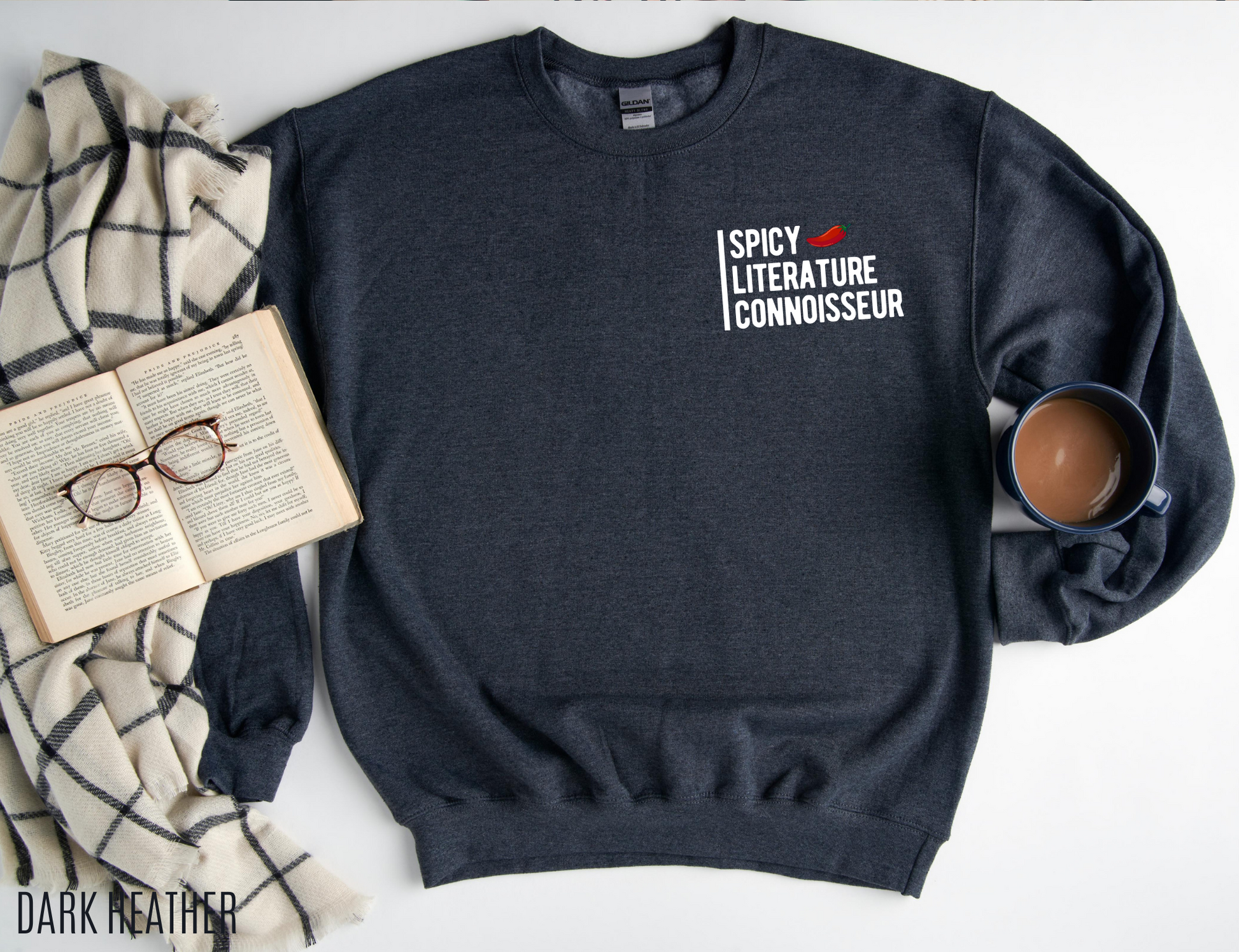 dark heather sweatshirt with Spicy Literature Connoisseur text and pepper icon, styled with book and coffee