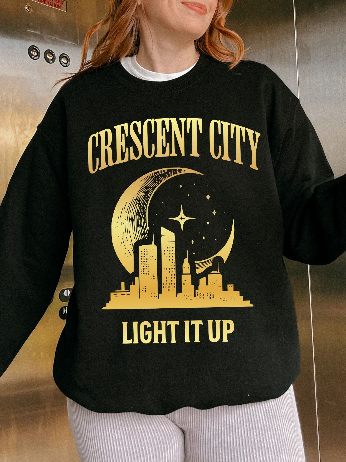 Light It Up Sweatshirt | Crescent City Merch