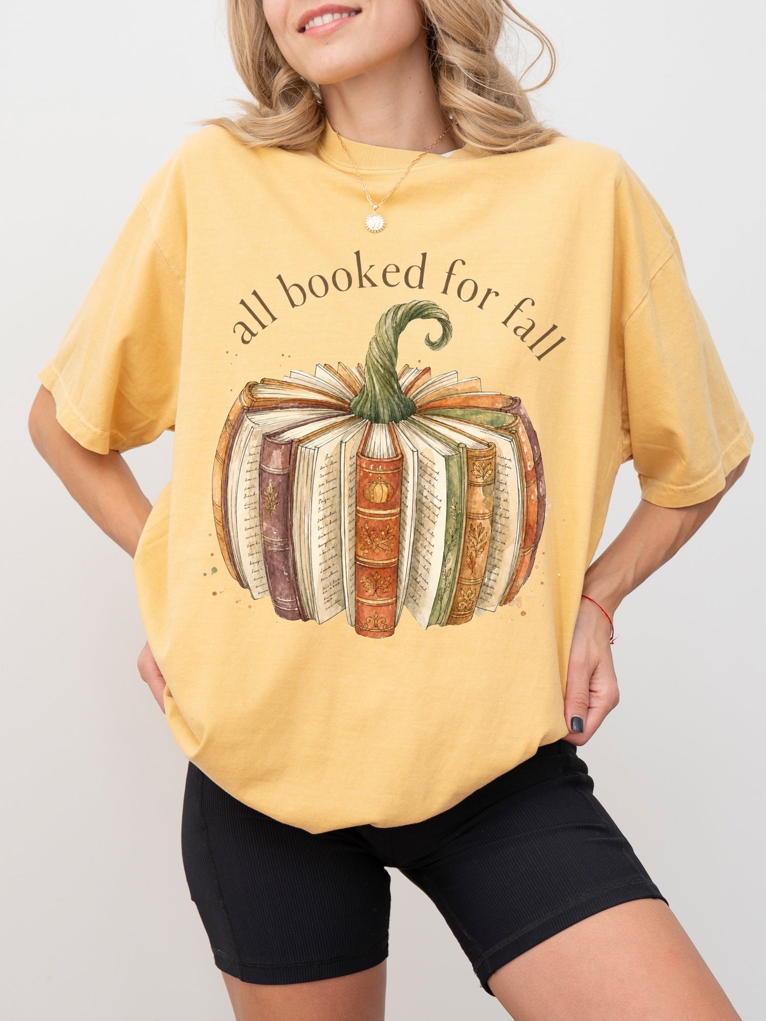 All Booked for Fall fall reading Comfort Colors shirt in mustard with watercolor pumpkin made from vintage books