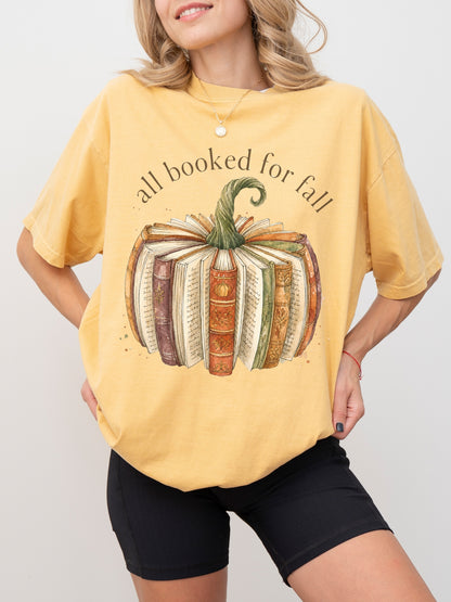 All Booked for Fall fall reading Comfort Colors shirt in mustard with watercolor pumpkin made from vintage books