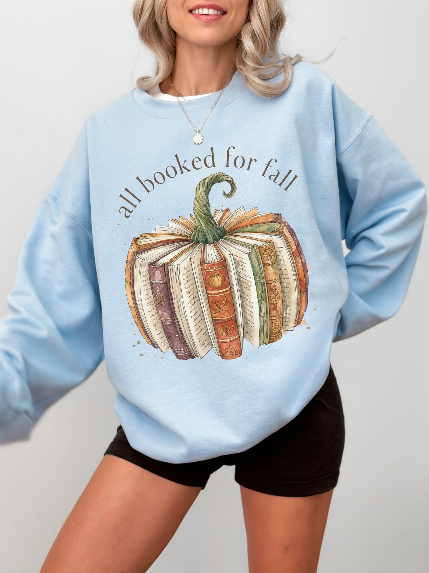 All Booked for Fall bookish Gildan sweatshirt in light blue with watercolor pumpkin made from vintage books