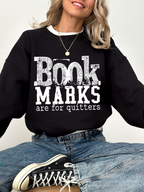 black gildan sweatshirt with bold book marks are for quitters distressed graphic for bookworms and librarians