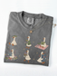 folded pepper comfort colors book lover goose shirt featuring cute ducks reading books carrying novels and cozy reader aesthetic artwork