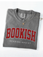 folded grey Comfort Colors shirt that says Bookish Reading Addict in red varsity letters with necklace