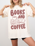woman wearing an ivory Comfort Colors shirt featuring a books and coffee design with stacked books, open book, and coffee mug illustration, oversized book lover apparel for readers and coffee fans
