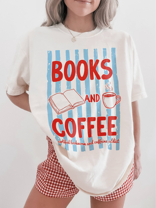 woman wearing ivory graphic t shirt with books and coffee design featuring open book and coffee mug for book lovers and caffeine addicts