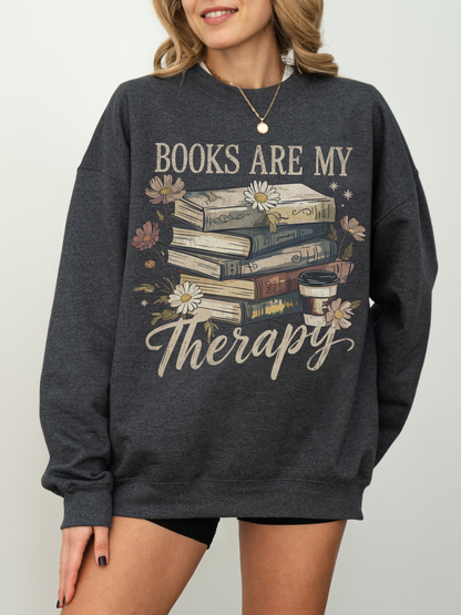 woman modeling dark heather gray sweatshirt with retro flower and book design and quote books are my therapy