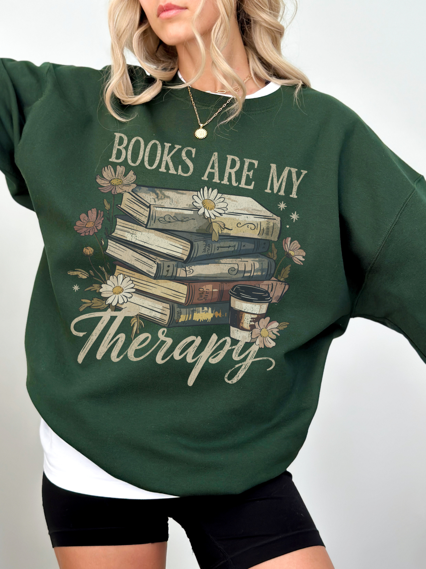 forest green books are my therapy sweatshirt featuring distressed books floral art and takeaway coffee cup