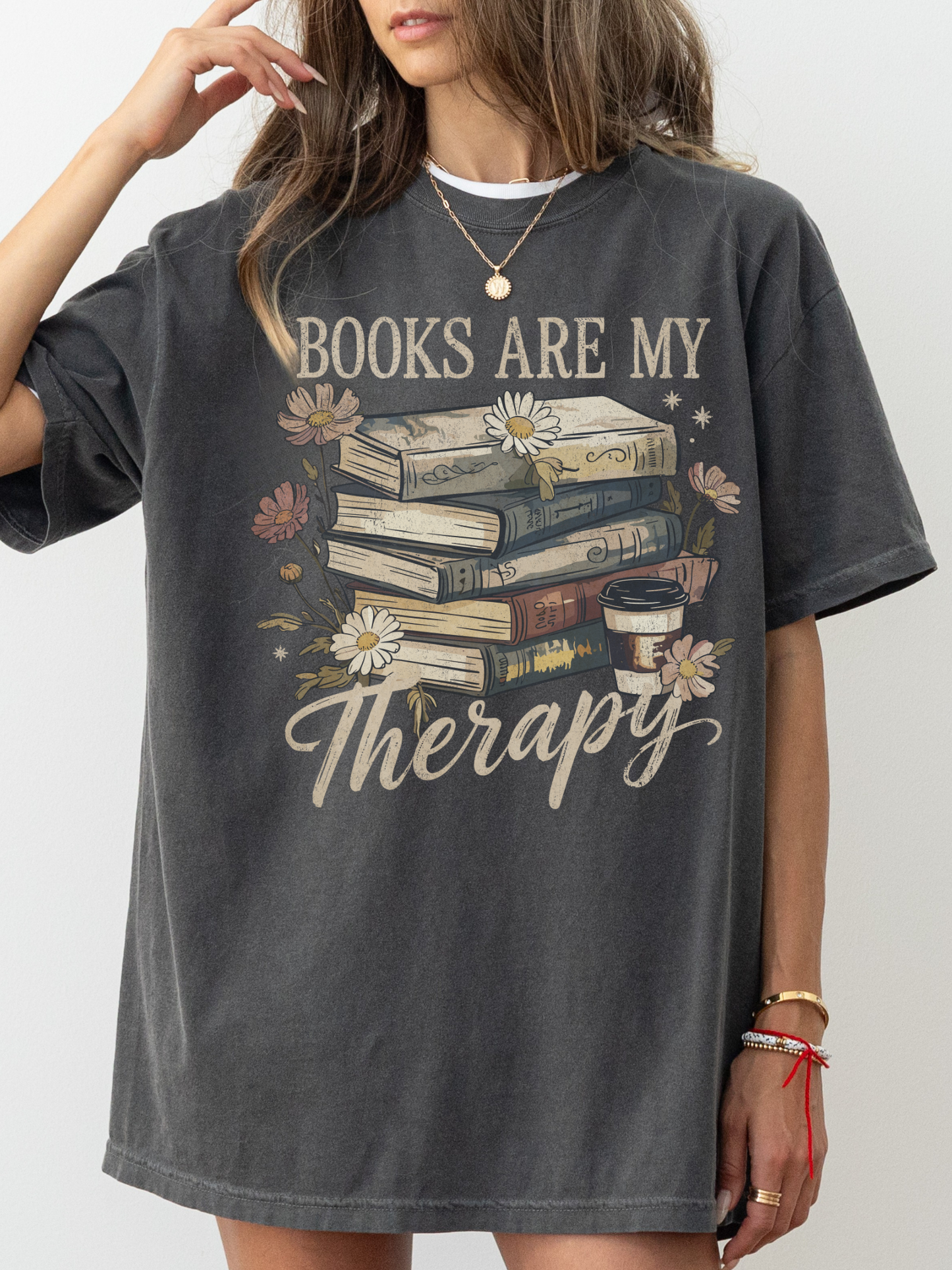 Oversized faded black Books Are My Therapy T-shirt styled as dress with vintage books and coffee graphic