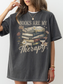 Oversized faded black Books Are My Therapy T-shirt styled as dress with vintage books and coffee graphic
