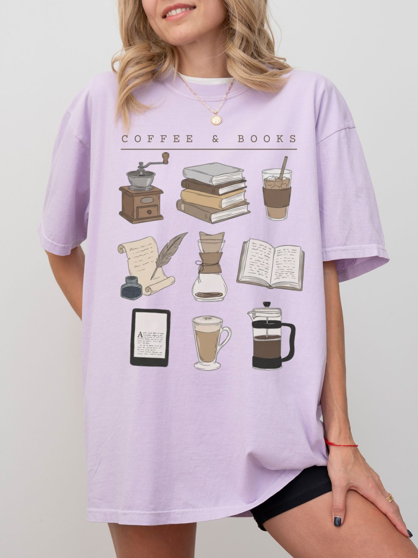 model in orchid reading t-shirt with coffee and books graphic design