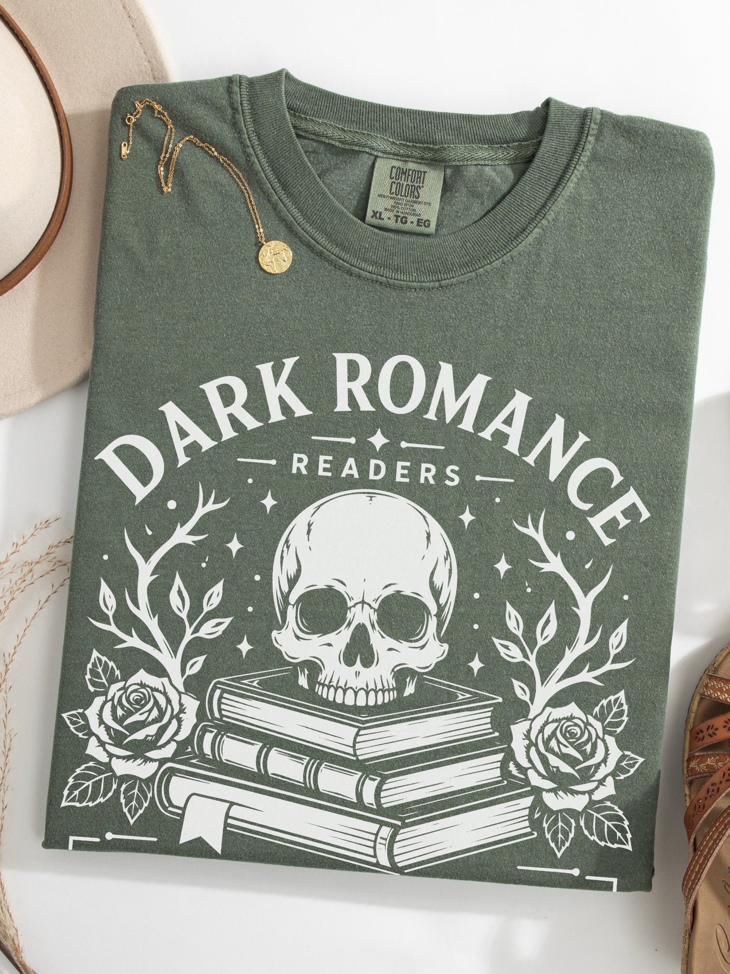 Moss Comfort Colors bookish shirt featuring Dark Romance Readers Book Club design with a skull resting on stacked books surrounded by roses