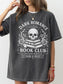 Model wearing a Pepper Comfort Colors bookish shirt with Dark Romance Readers Book Club design featuring a skull, stacked books and roses for dark romance book lovers