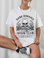Model wearing a White bookish shirt featuring Dark Romance Readers Book Club text with skull, stacked books and roses graphic for dark romance readers