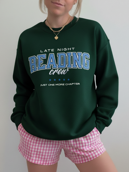 Forest green sweatshirt with vintage “Late Night Reading Crew” print and collegiate vibes, styled with pink gingham shorts.