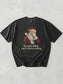 Graphite Comfort Colors shirt featuring vintage Santa covering his eyes with he sees what you’ve been reading text, a funny Christmas bookish shirt for readers and book lovers