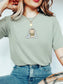 Bay Comfort Colors shirt featuring a cute hedgehog reading a book while wrapped in a blue striped blanket, cozy reading shirt and book lover gift for readers and bookworms