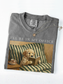 pepper comfort colors shirt folded with dog reading book graphic vintage style cozy reading aesthetic with necklace detail minimalist product photo