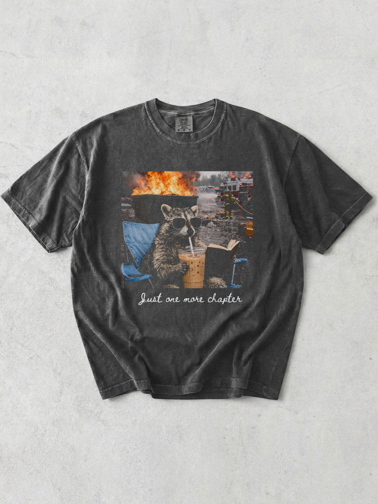 pepper comfort colors raccoon just one more chapter shirt with funny reading graphic iced coffee and fire background design
