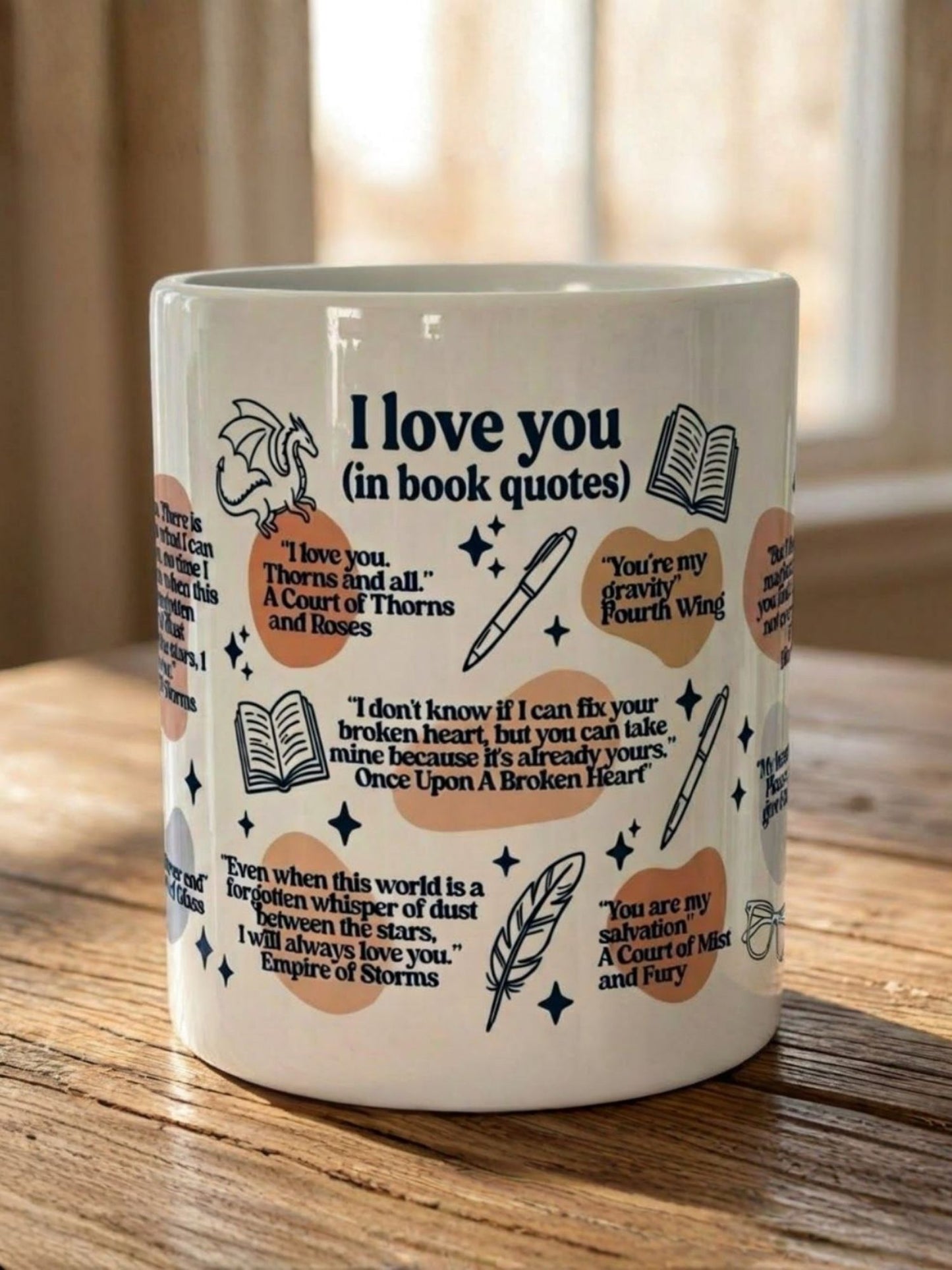 Close up of literary love mug with romance and fantasy inspired quotes on wooden table cozy reader coffee cup gift