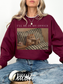 Maroon oversized sweatshirt featuring Ill be in my office text and a vintage cat reading a book design with striped bedding and tea cup detail. Warm cozy outfit for book lovers, readers, and cat themed fashion.