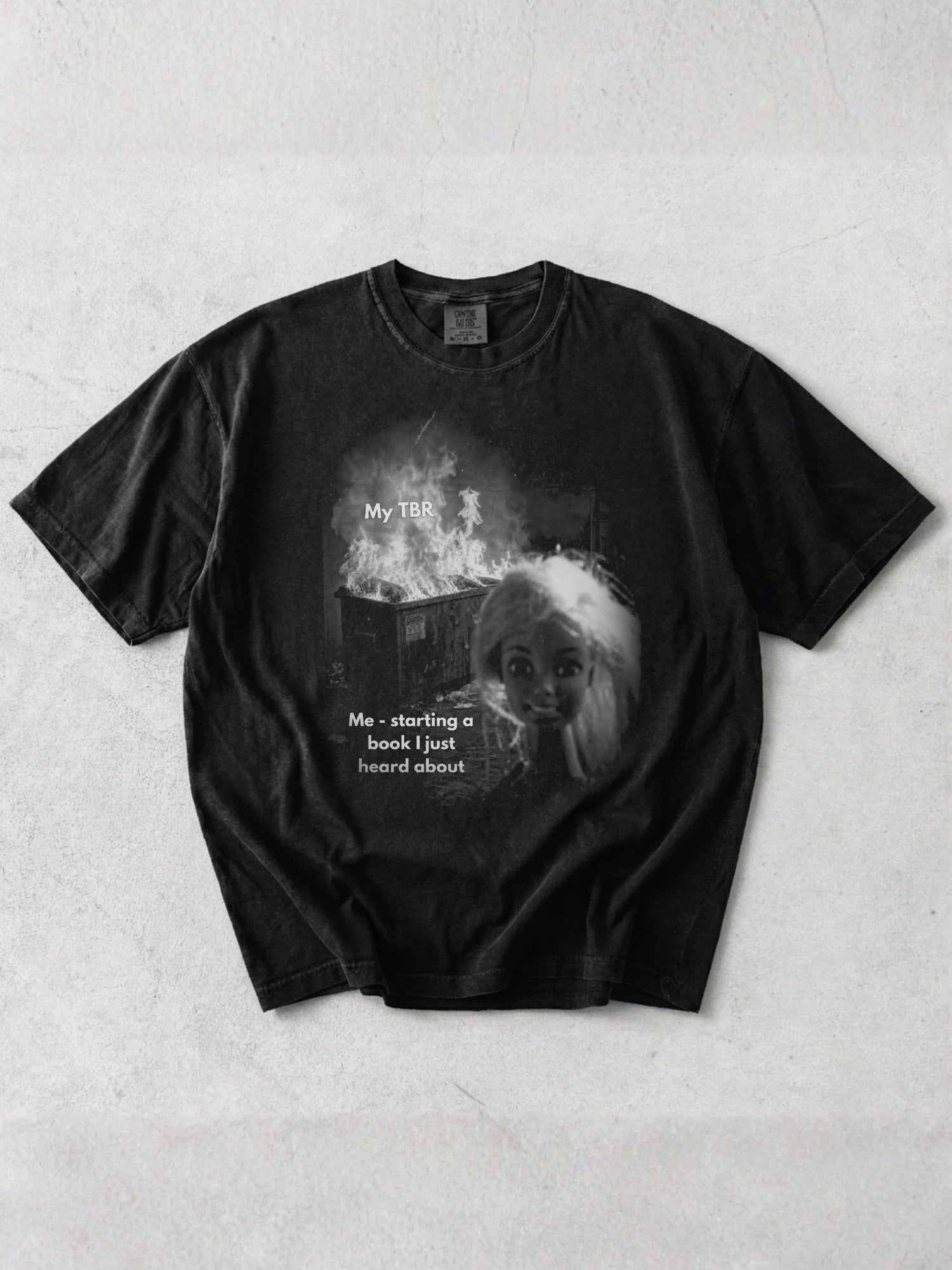 Graphite Comfort Colors shirt featuring a funny reader meme design with a burning My TBR pile and Me starting a book I just heard about text, humorous book lover shirt for readers with an endless to be read list
