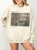 woman in sand-colored sweatshirt with Pemberley House print and Pride & Prejudice quote design