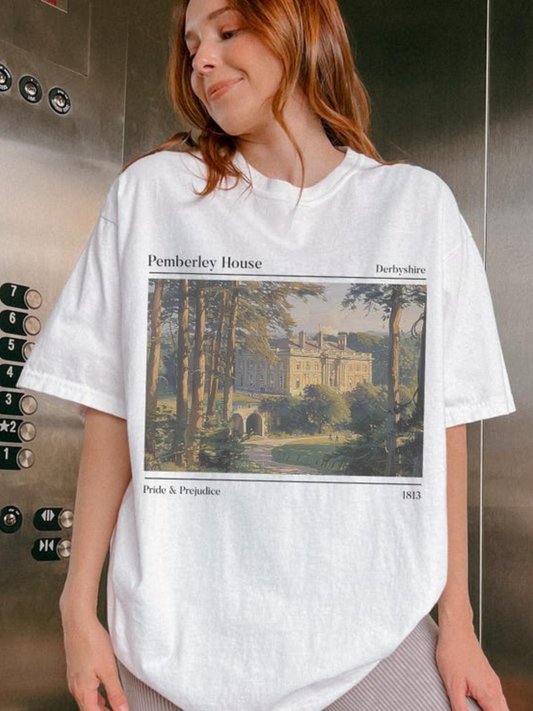 woman in white Pemberley House t-shirt with colorful vintage print of Pride & Prejudice estate