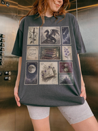 Woman wearing pepper fantasy book lover t shirt with vintage postage stamp artwork featuring dragon celestial moon books flowers and gothic castle aesthetic