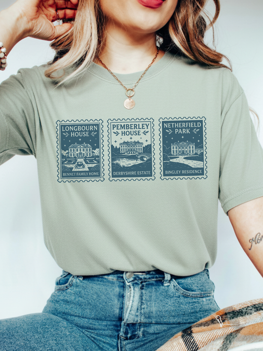 woman wearing bay green t shirt with vintage postage stamp style design featuring Longbourn House Pemberley House and Netherfield Park from Pride and Prejudice