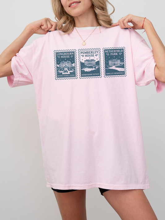 woman wearing oversized pink t shirt with Pride and Prejudice stamp illustrations of Longbourn House Pemberley House and Netherfield Park aesthetic book lover outfit