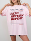 woman wearing a blossom pink Comfort Colors shirt featuring a vintage library card design with read return repeat text in red, oversized fit styled with biker shorts for a casual reader and librarian inspired look