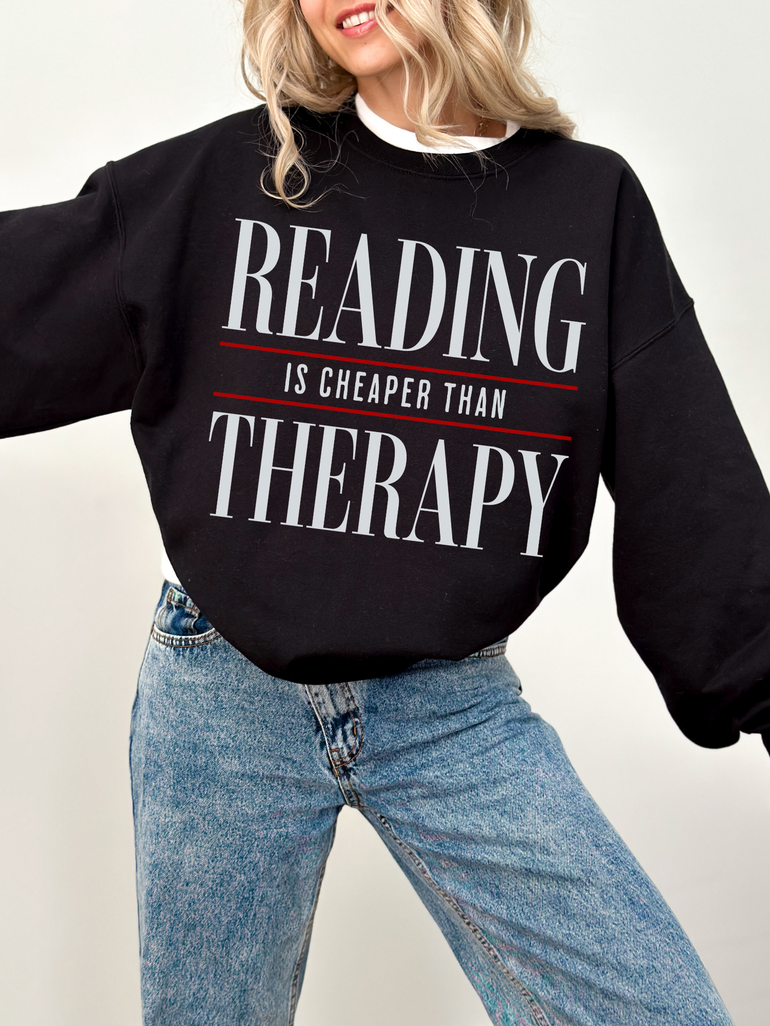 black reading is cheaper than therapy sweatshirt with minimalist quote design cozy book lover crewneck styled with jeans