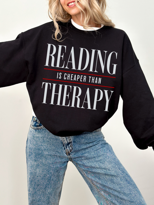 black reading is cheaper than therapy sweatshirt with minimalist quote design cozy book lover crewneck styled with jeans