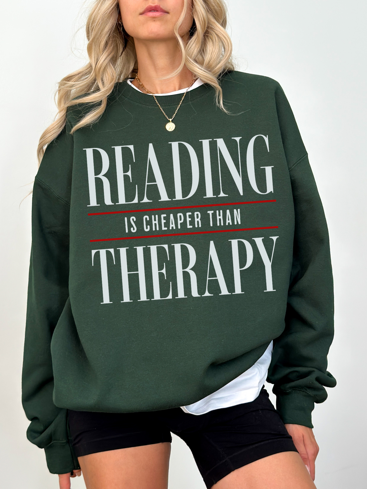 forest green reading is cheaper than therapy sweatshirt for readers and bookworms with large typography graphic design