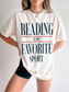 model wearing ivory reading is my favorite sport t shirt with minimal typography design styled in neutral aesthetic outfit