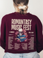 Maroon crewneck sweatshirt shown from the back with large Romantasy Music Fest print, showcasing a fantasy-inspired concert-style design with a skull, flowers, and popular romantasy tropes.