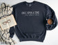 dark heather sweatshirt laid out with mug, book, and plaid blanket, text reads once upon a time but make it spicy