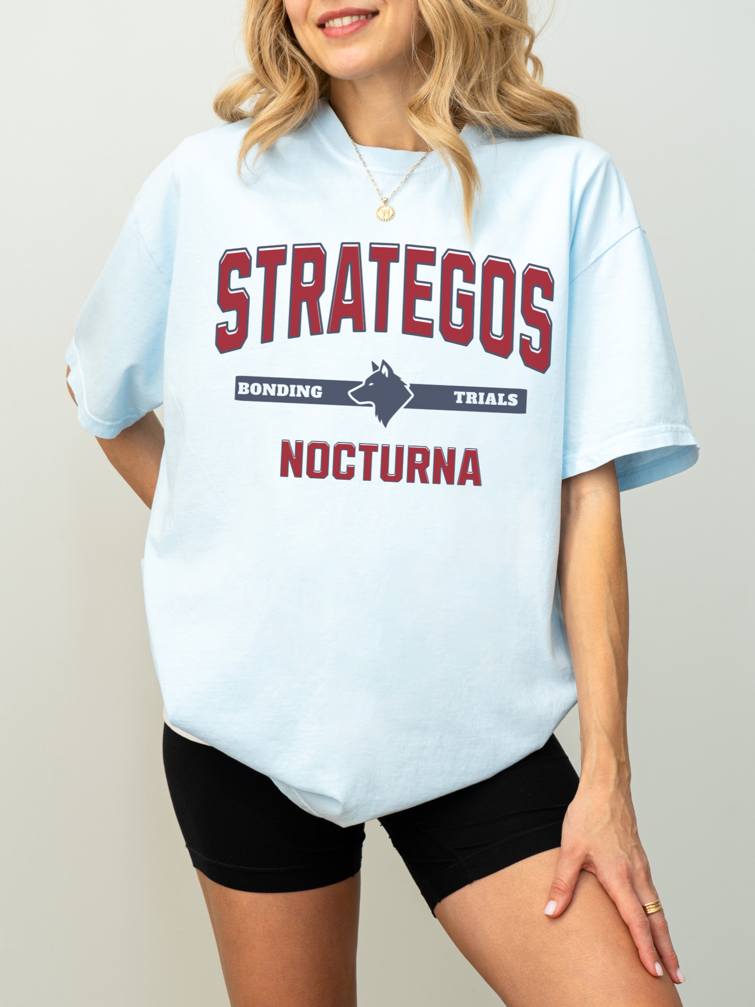 chambray blue comfort colors t shirt with Strategos Nocturna bonding trials collegiate fantasy graphic