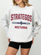ash gray sweatshirt with Strategos Nocturna collegiate fantasy graphic and bonding trials wolf emblem