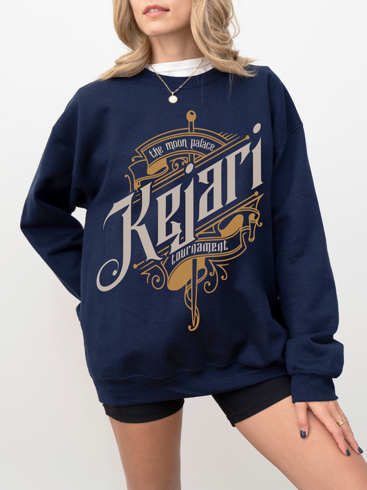 Navy blue fantasy-themed Kejari Tournament sweatshirt worn with black shorts, showing off vintage bookish aesthetic and layered necklace styling.