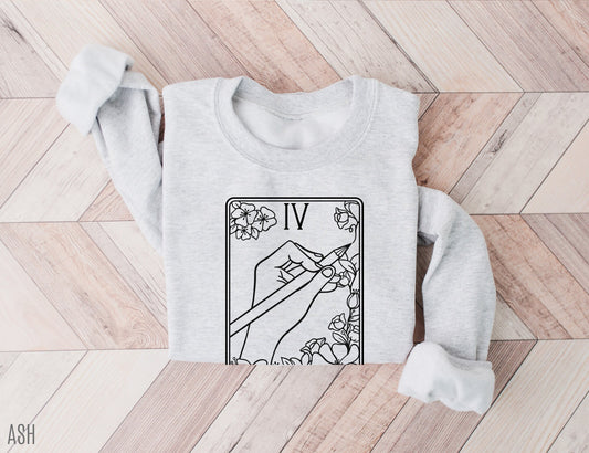 folded ash grey sweatshirt with black linework tarot card design and fantasy bookish theme
