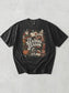 Graphite Comfort Colors shirt featuring a Tis Reading Season design with books, open book, coffee mug, pumpkin, autumn leaves, winter scarf, knit hat and cozy cottage, seasonal bookish t shirt for readers.