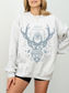 woman in ash grey Throne of Glass sweatshirt with blue Terrasen crest and “To Whatever End” fantasy book quote

