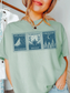 woman wearing bay fantasy book stamp t-shirt featuring Velaris, Terrasen, and Crescent City from Sarah J. Maas books